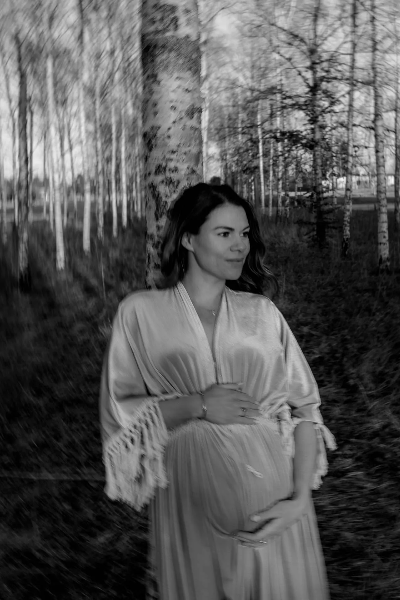 Schwangerschaftsshooting am gefrorenen See bei Abendlicht